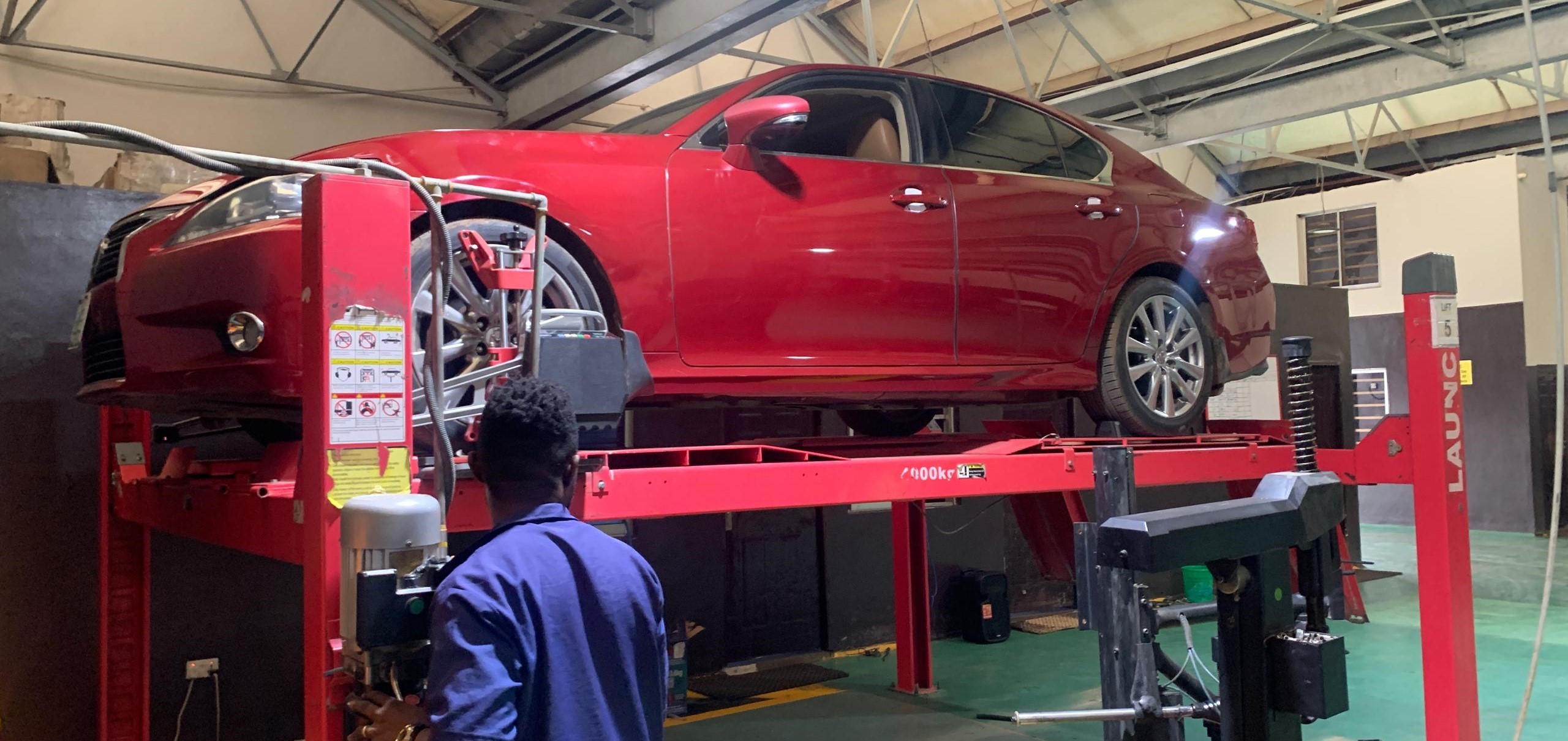 high-tech wheel alignment machine in shop